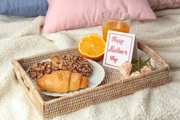 Card with words "Happy Mother's day" and tasty breakfast on tray — Stock Photo, Image