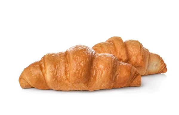 Croissants saborosos no fundo branco — Fotografia de Stock