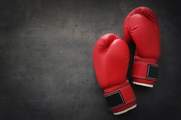 Boxing gloves on gray background — Stock Photo, Image