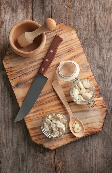 Bowl Chopped Garlic Cloves Jar Wooden Board — Stock Photo, Image