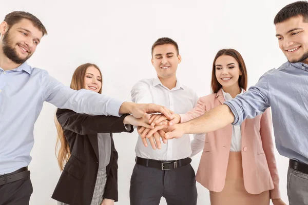 Young people putting hands together, closeup. Unity concept — Stock Photo, Image