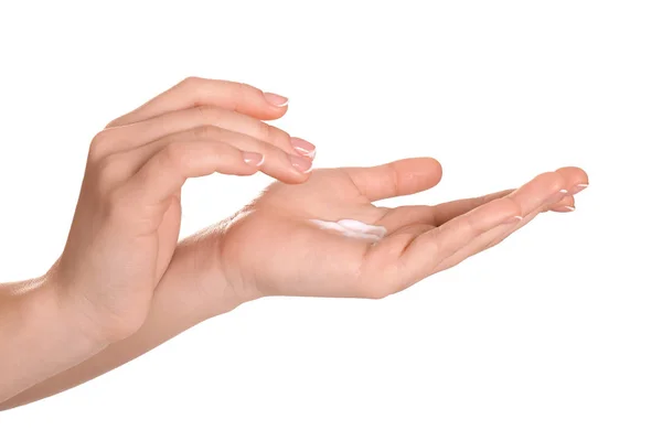 Woman applying body cream on white background — Stock Photo, Image