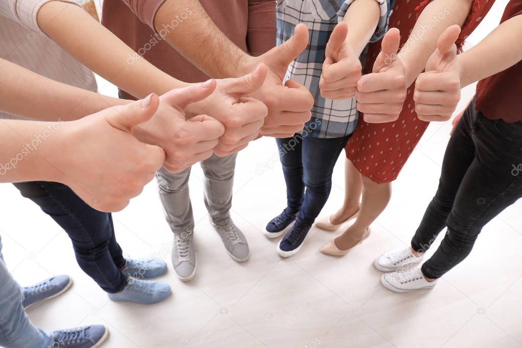 Group of people showing thumb-up gesture. Unity concept