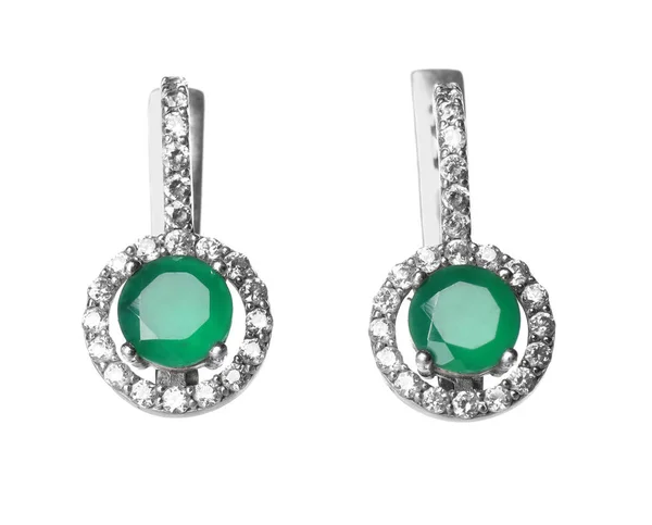 Beautiful earrings with emeralds — Stock Photo, Image