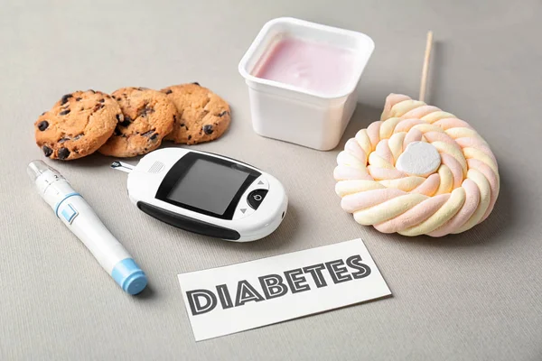 Composition Word Diabetes Sweets Digital Glucometer Light Background — Stock Photo, Image