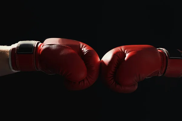 Men in boxing gloves on black — Stock Photo, Image