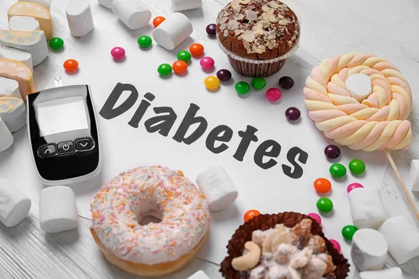 Composición Con Palabra Diabetes Dulces Glucosímetro Digital Sobre Fondo Madera — Foto de Stock