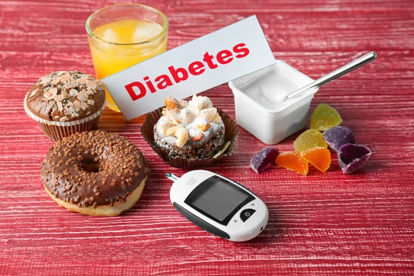 Composition Word Diabetes Sweets Digital Glucometer Wooden Background — Stock Photo, Image