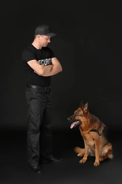 Security guard with dog — Stock Photo, Image