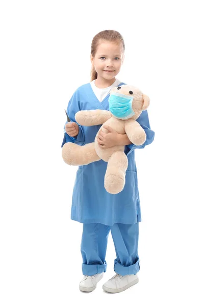 Little girl in doctor uniform Stock Photo