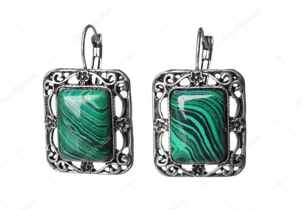 Beautiful earrings with malachite isolated on white