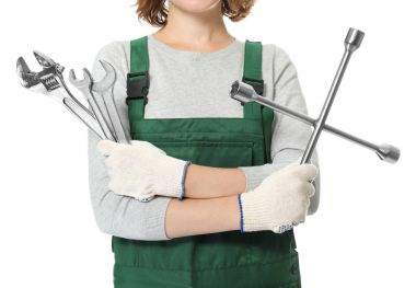 Female auto mechanic with tools on white background, closeup clipart