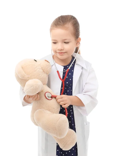 Liten flicka i läkare uniform — Stockfoto