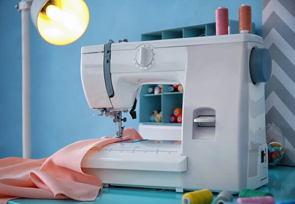 Sewing machine with fabric  