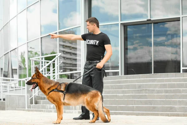 Security guard with dog