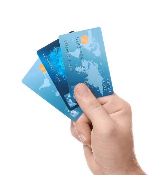 Man holding credit cards on white background — Stock Photo, Image