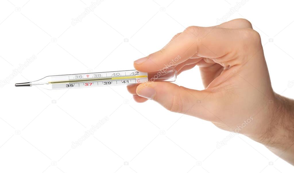 Woman holding mercury thermometer  
