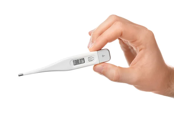 Woman holding digital thermometer on white background — Stock Photo, Image