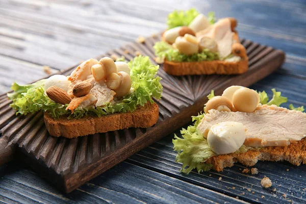 Tasty chicken bruschettas — Stock Photo, Image