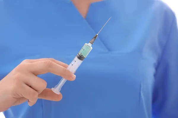 Doctor holding syringe — Stock Photo, Image