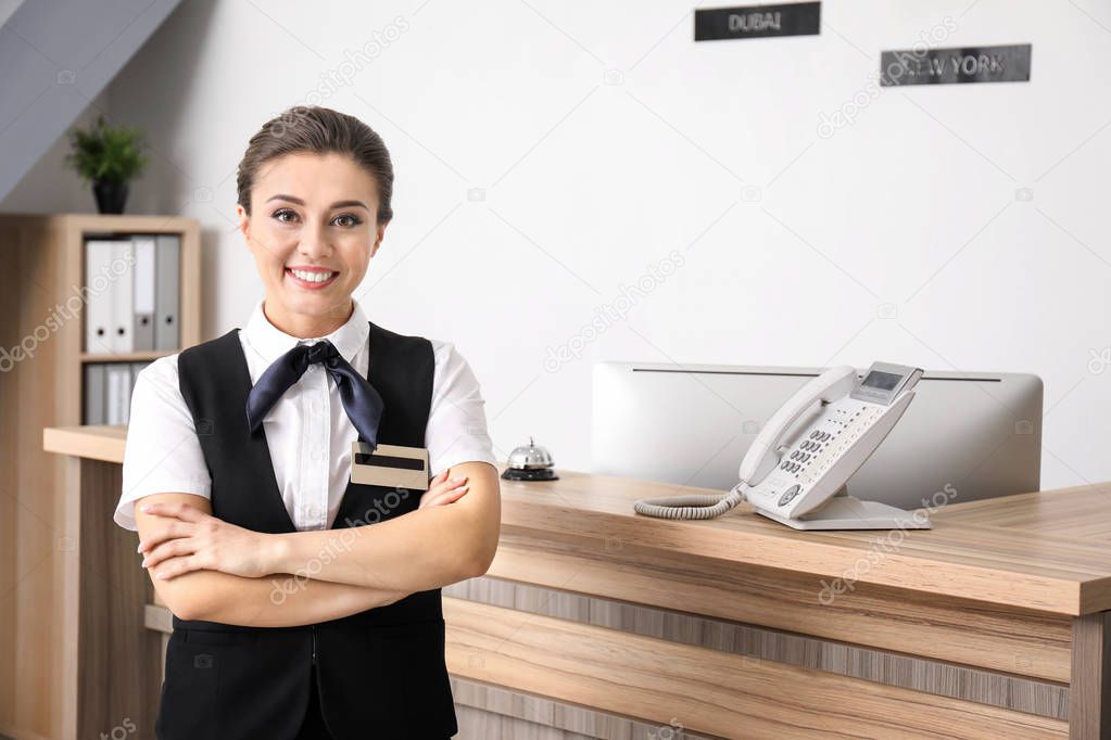 Female hotel receptionist at workplace