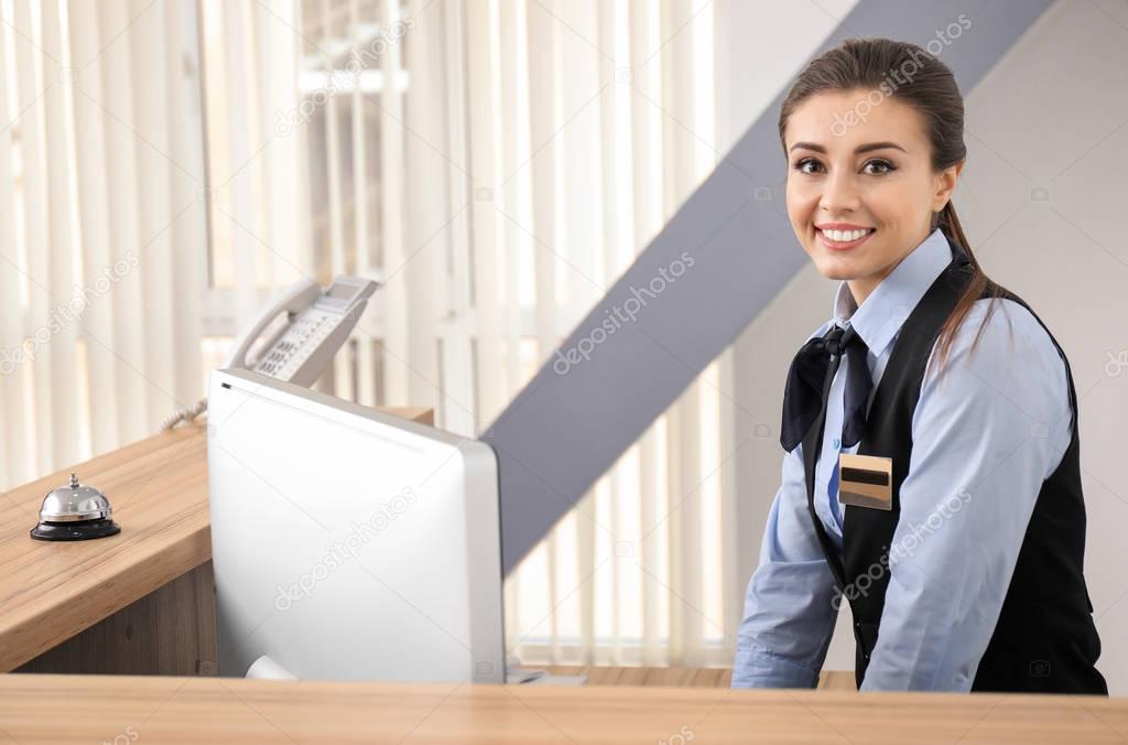 Female receptionist working in hotel