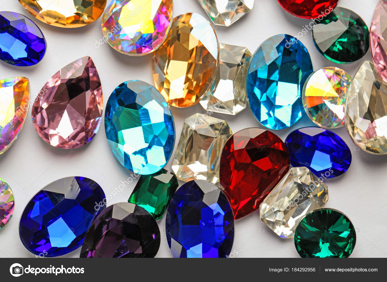 Precious jewels on white background Stock Photo by ©belchonock 184292956