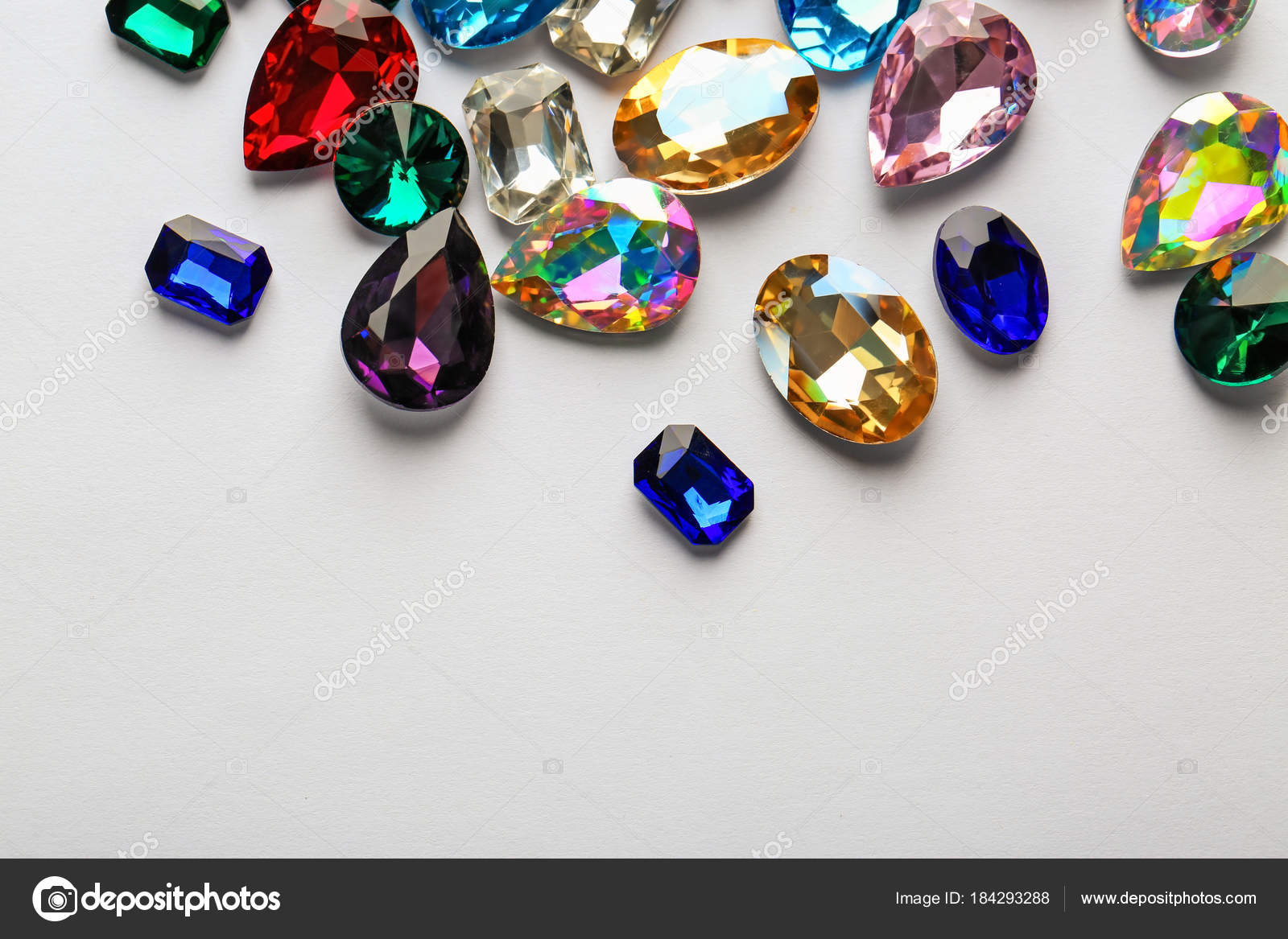 Precious jewels on white background Stock Photo by ©belchonock 184293288