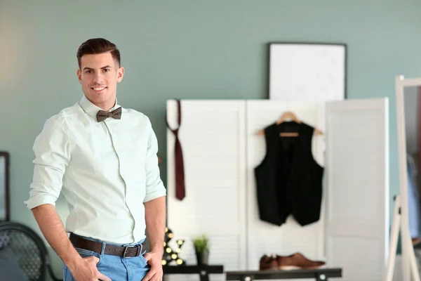 Man in new outfit indoors. — Stock Photo, Image