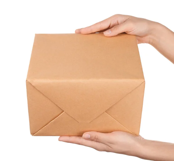 Woman holding parcel on white background — Stock Photo, Image