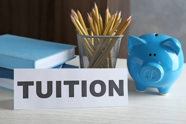 Carta con la parola TUITION — Foto Stock