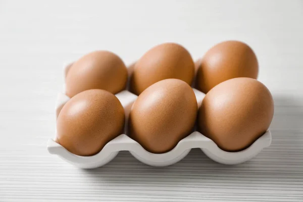 Holder with chicken eggs — Stock Photo, Image