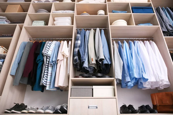 Big wardrobe with male clothes for dressing room — Stock Photo, Image