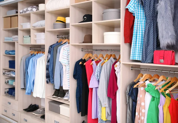 Big wardrobe with different clothes for dressing room — Stock Photo, Image