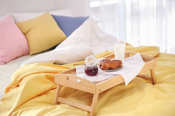 Tasty breakfast on bed — Stock Photo, Image