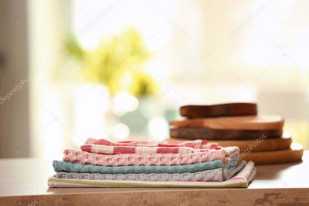 Clean kitchen towels on table