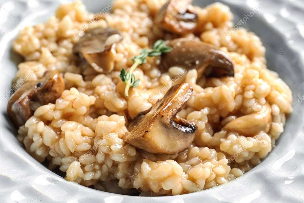 Plate with delicious risotto and mushroom