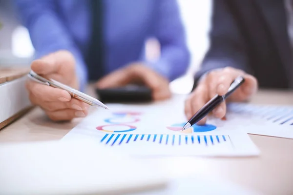 Men working at table in office, closeup. Financial trading concept — Stock Photo, Image