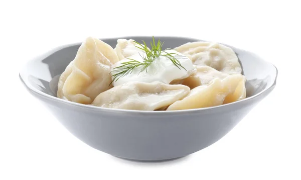 Tasty dumplings with sour cream — Stock Photo, Image