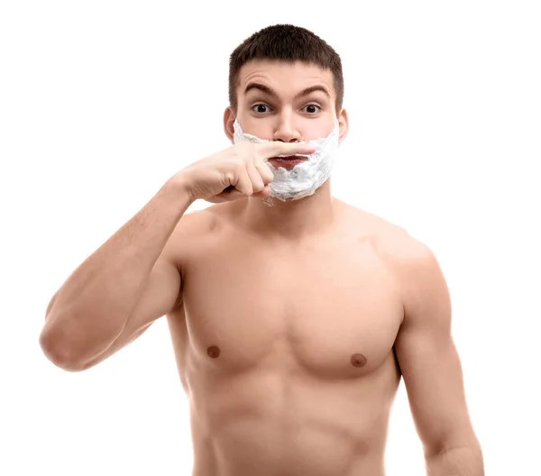 Young man with shaving foam — Stock Photo, Image