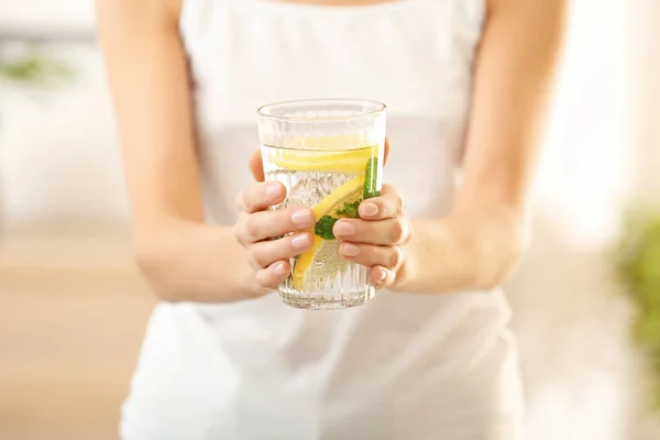 Young woman with glass of fresh lemonade, closeup — Stock Photo, Image