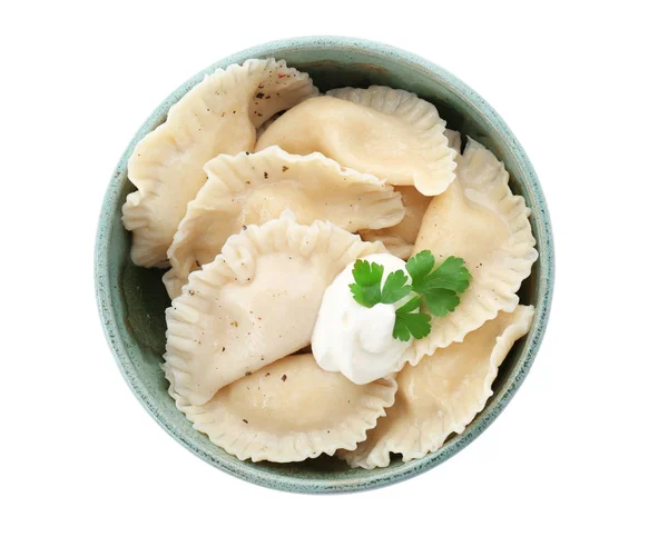 Tasty dumplings with sour cream — Stock Photo, Image