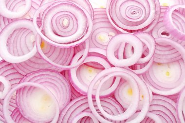 Arka plan olarak kırmızı soğan taze dilim