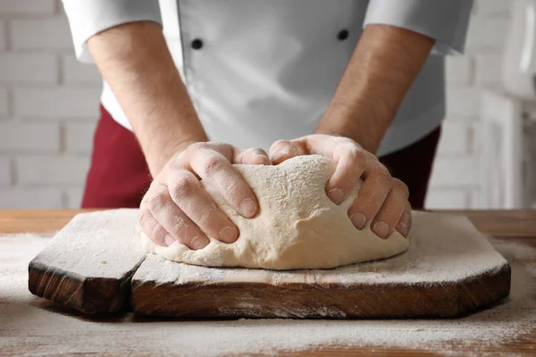 Man Kneading Dough Wooden Board Sprinkled Flour — Stock Photo, Image