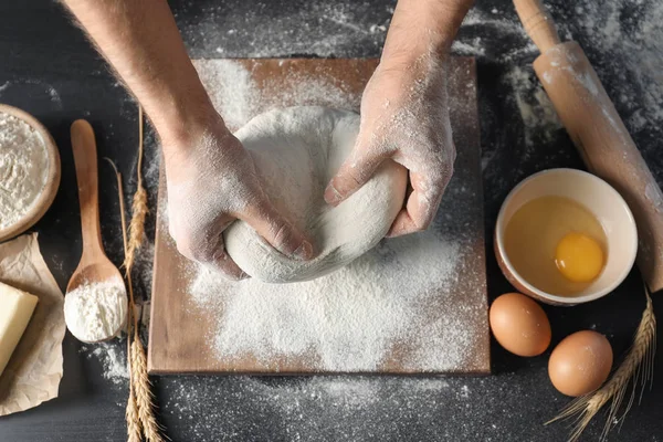 Man Kneading Dough Wooden Board Sprinkled Flour — Stock Photo, Image