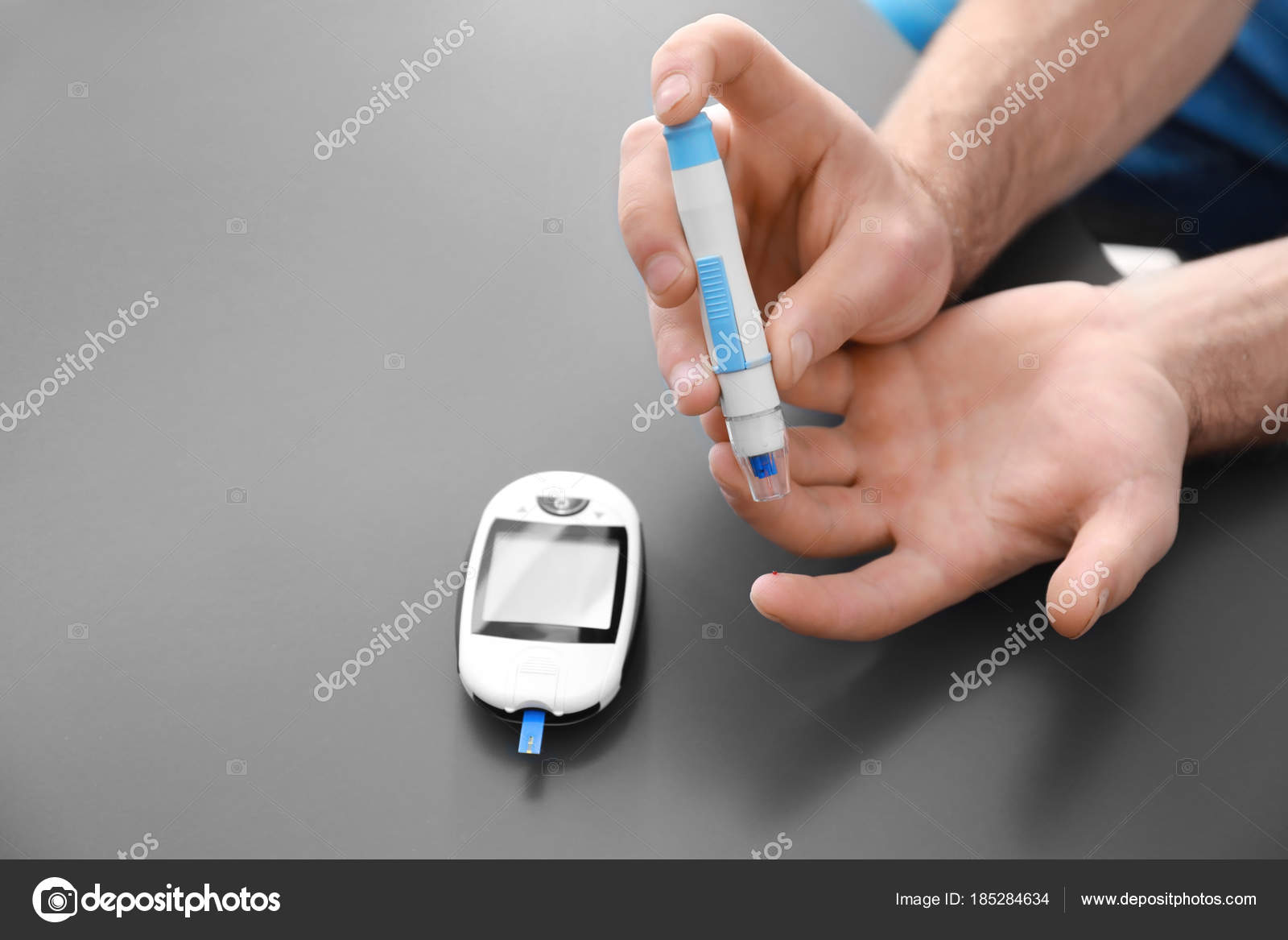 Diabetic Man Using Lancet Pen Digital Grey Background