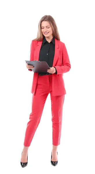 Beautiful young woman in elegant suit and with clipboard on white background — Stock Photo, Image