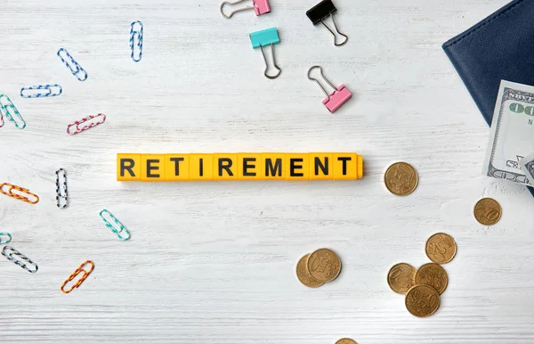 Word Retirement Clips Money Light Background Pension Planning — Stock Photo, Image