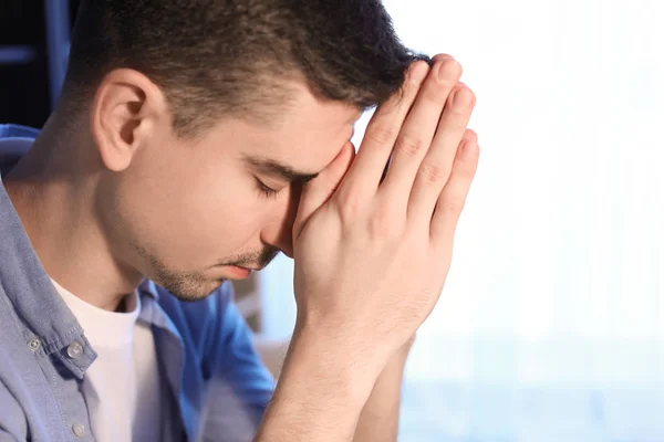 Religious Young Man Praying God Home — Stock Photo, Image