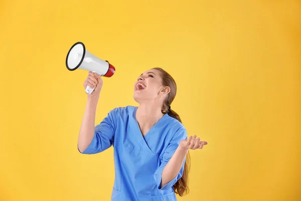 Young Female Doctor Megaphone Yellow Background — Stock Photo, Image